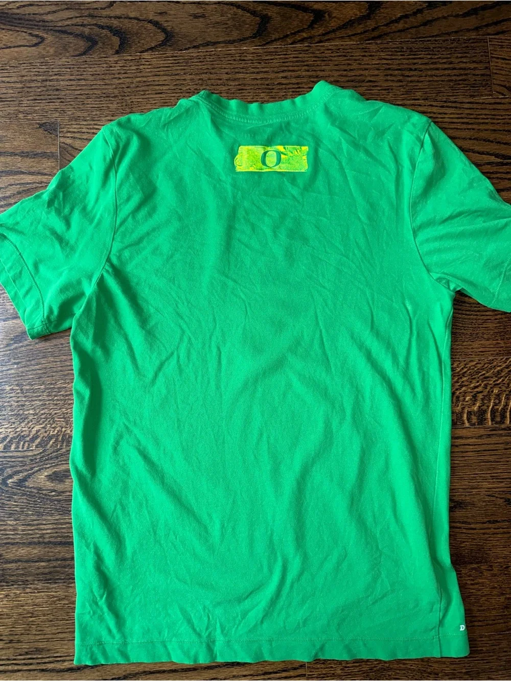 Nike Green Short Sleeve 'Ducks' Graphic Tee with Yellow Accents